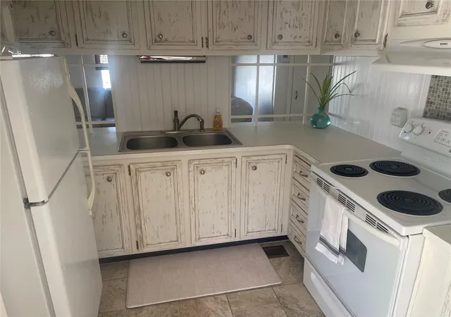 Listing Photo 1 - Condo for sale in building located at 4851 W Gandy Blvd, TAMPA, FL 33611 - Unit #B9L31