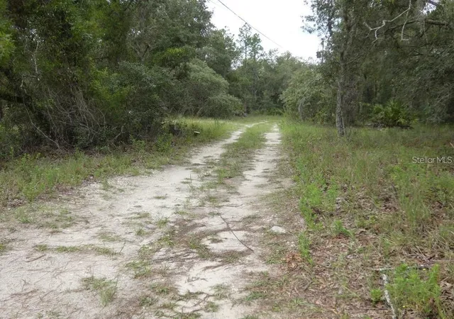 Photo 3 of Manufactured home for sale at 12122 Seiffert Rd, Hudson, FL 34667 | MLS# W7890062 | Listing updated on 2026-10-09