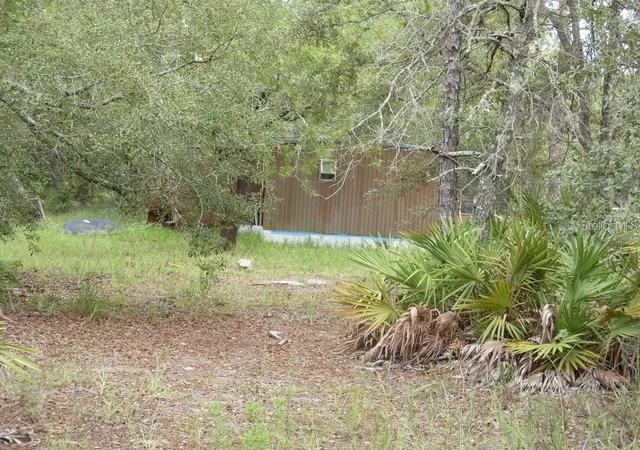 Photo 4 of Manufactured home for sale at 12122 Seiffert Rd, Hudson, FL 34667 | MLS# W7890062 | Listing updated on 2026-10-09