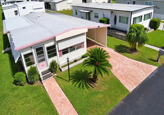 Photo 1 of Manufactured home for sale at 209 Orchid Ter, Haines City, FL 33844 | MLS# P4940069 | Listing updated on 2026-10-07