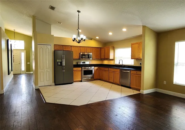 Photo 3 of Single family home for sale at 30702 Iverson Dr, Wesley Chapel, FL 33543 | MLS# W7890064 | Listing updated on 2026-10-04
