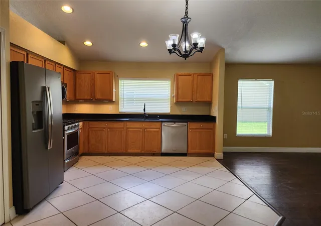 Photo 4 of Single family home for sale at 30702 Iverson Dr, Wesley Chapel, FL 33543 | MLS# W7890064 | Listing updated on 2026-10-04