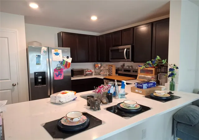 Photo 3 of Townhouse for sale at 6645 SW 81st Loop, Ocala, FL 34476 | MLS# OM733421 | Listing updated on 2026-10-09