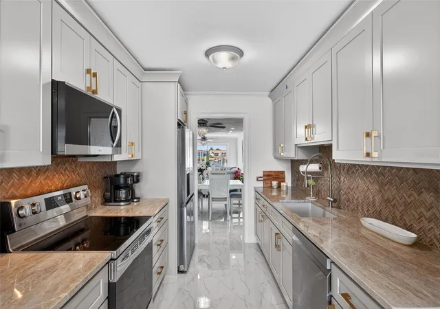 Photo 3 of House for sale at 427 Boca Ciega Point Blvd N, Saint Petersburg, FL 33708 | MLS# TB8554713 | Listing updated on 2026-10-05