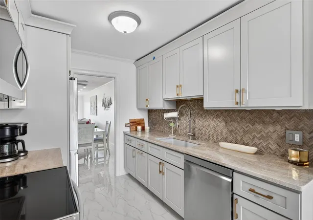Photo 4 of House for sale at 427 Boca Ciega Point Blvd N, Saint Petersburg, FL 33708 | MLS# TB8554713 | Listing updated on 2026-10-05