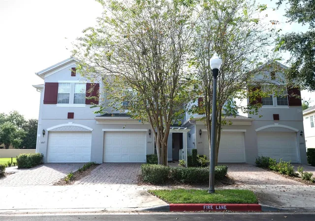 Photo 1 of Townhouse for sale at 6063 Strada Isle Way, Orlando, FL 32835 | MLS# O6447131 | Listing updated on 2026-10-06