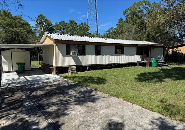 Photo 2 of Manufactured home for sale at 3256 Kilbee St, Mims, FL 32754 | MLS# S5158852 | Listing updated on 2026-10-07