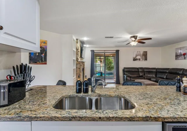 Photo 4 of Single family home for sale at 583 Longwood Ct, Oldsmar, FL 34677 | MLS# W7890073 | Listing updated on 2026-10-05