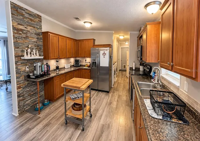 Photo 4 of Manufactured home for sale at 12831 Hawk Hl Dr, Thonotosassa, FL 33592 | MLS# TB8554750 | Listing updated on 2026-10-08