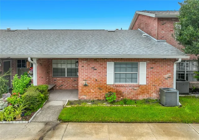 Photo 2 of Townhouse for sale at 1225 Carriage Ln #1, Orlando, FL 32807 | MLS# O6447144 | Listing updated on 2026-10-08