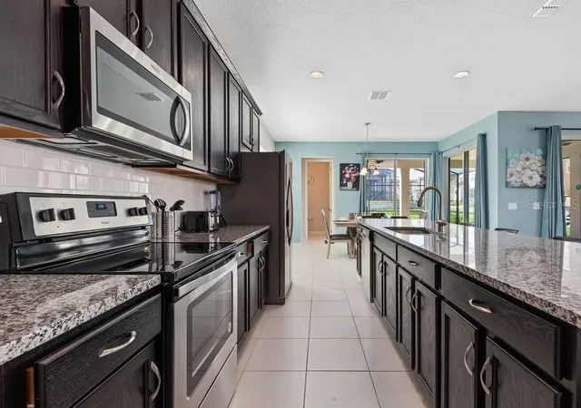 Photo 3 of Single family home for sale at 1848 Sandy Park Trl, Kissimmee, FL 34747 | MLS# O6447156 | Listing updated on 2026-10-07