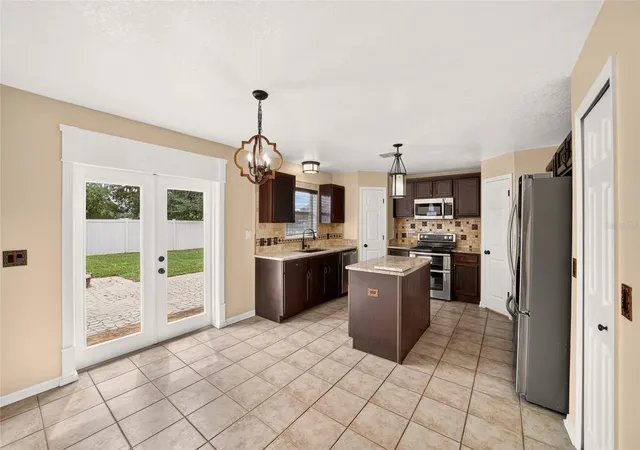Photo 3 of Single family home for sale at 6934 SW 129th Street, Ocala, FL 34473 | MLS# OM733435 | Listing updated on 2026-10-08