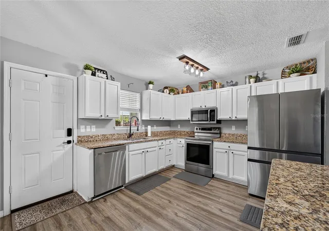 Photo 3 of Single family home for sale at 1257 Drew St, Lakeland, FL 33810 | MLS# TB8554844 | Listing updated on 2026-10-25