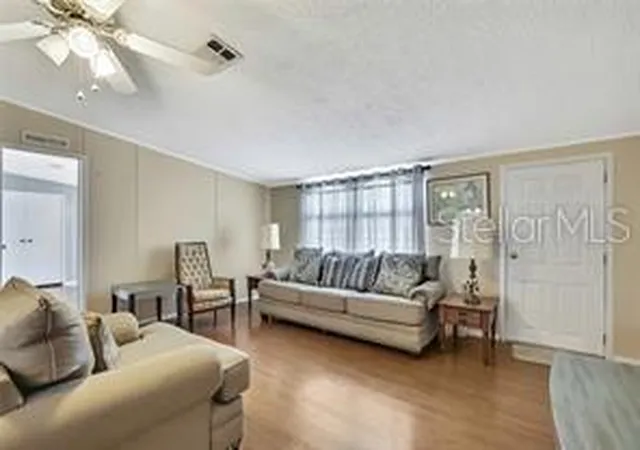 Photo 4 of Manufactured home for sale at 2400 Lemur Dr, Holiday, FL 34690 | MLS# TB8554875 | Listing updated on 2026-10-06