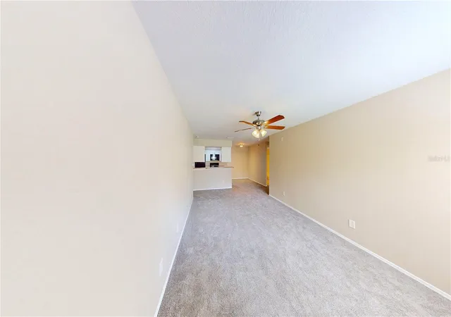 Listing Photo 4 - Condo for sale in building located at 36100 Lake Chase Blvd, Zephyrhills, FL 33541 - Unit #104
