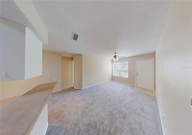 Listing Photo 5 - Condo for sale in building located at 36100 Lake Chase Blvd, Zephyrhills, FL 33541 - Unit #104