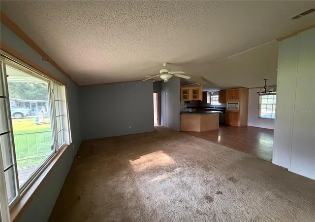 Photo 4 of Manufactured home for sale at 17131 NW 83rd Court, Trenton, FL 32693 | MLS# OM733450 | Listing updated on 2026-10-08