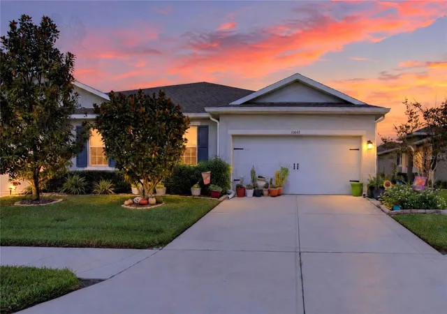 Photo 1 of House for sale at 10648 Heron Hideaway Loop, Land O Lakes, FL 34638 | MLS# TB8554928 | Listing updated on 2026-10-06