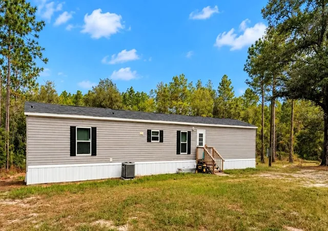 Photo 1 of Manufactured home for sale at 6038 Nw 17th Court, Bell, FL 32619 | MLS# GC543967 | Listing updated on 2026-10-05
