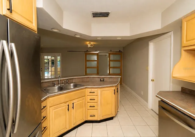 Photo 4 of Single family home for sale at 4828 Judy Ann Ct, Orlando, FL 32808 | MLS# O6447263 | Listing updated on 2026-10-09