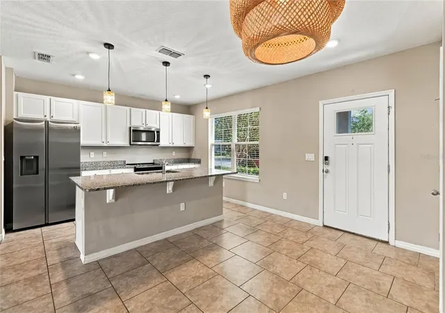 Photo 4 of Townhouse for sale at 10114 Salt Point Dr, Winter Garden, FL 34787 | MLS# O6447275 | Listing updated on 2026-10-09