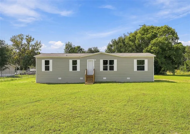 Photo 1 of Manufactured home for sale at 4235 Linda Dr, Wesley Chapel, FL 33543 | MLS# TB8554945 | Listing updated on 2026-10-22