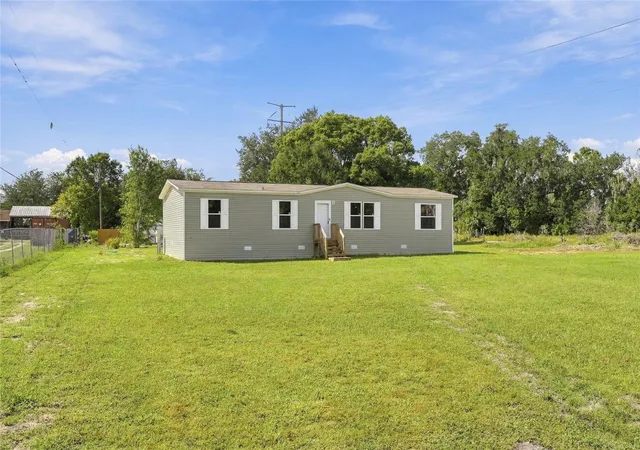 Photo 2 of Manufactured home for sale at 4235 Linda Dr, Wesley Chapel, FL 33543 | MLS# TB8554945 | Listing updated on 2026-10-22
