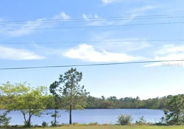 Photo 2 of Land for sale at 20106 E Colonial Dr, Christmas, FL 32709 | MLS# O6447289 | Listing updated on 2026-10-06