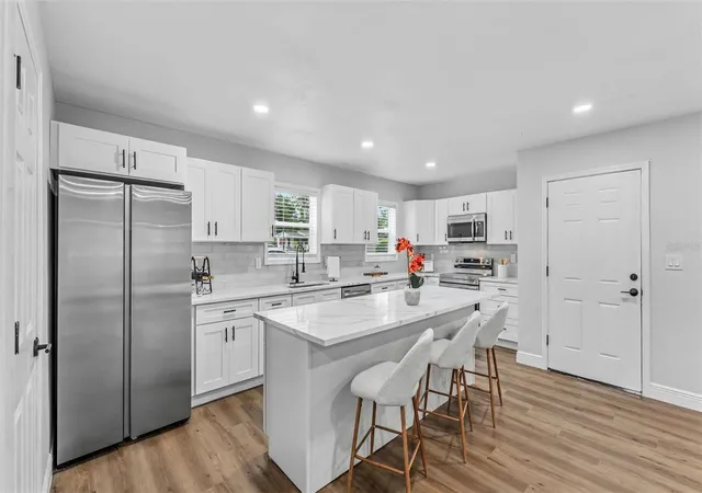 Photo 4 of Single family home for sale at 211 W Valencia St, Lakeland, FL 33805 | MLS# L4965554 | Listing updated on 2026-10-07