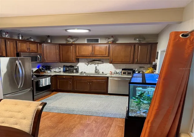 Photo 4 of Single family home for sale at 1711 Beatrice Dr, Orlando, FL 32810 | MLS# O6447300 | Listing updated on 2026-10-06