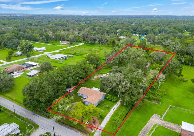 Photo 1 of Single family home for sale at 215 John Carroll Rd E, Lakeland, FL 33801 | MLS# O6447306 | Listing updated on 2026-10-10