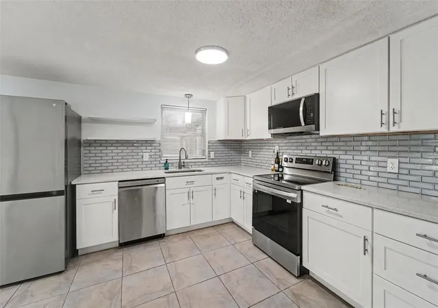 Photo 3 of Single family home for sale at 7922 Lilac Dr, Port Richey, FL 34668 | MLS# TB8554994 | Listing updated on 2026-10-11