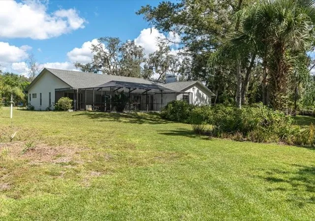 Photo 4 of Single family home for sale at 11211 Pine Forest Dr, New Port Richey, FL 34654 | MLS# W7890095 | Listing updated on 2026-10-07