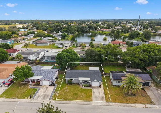 Photo 2 of Single family home for sale at 9850 Richwood Ln, Port Richey, FL 34668 | MLS# W7890096 | Listing updated on 2026-10-15
