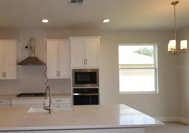 Photo 3 of Single family home for sale at 3174 Wolf Lake Ave, Apopka, FL 32712 | MLS# O6447342 | Listing updated on 2026-10-07