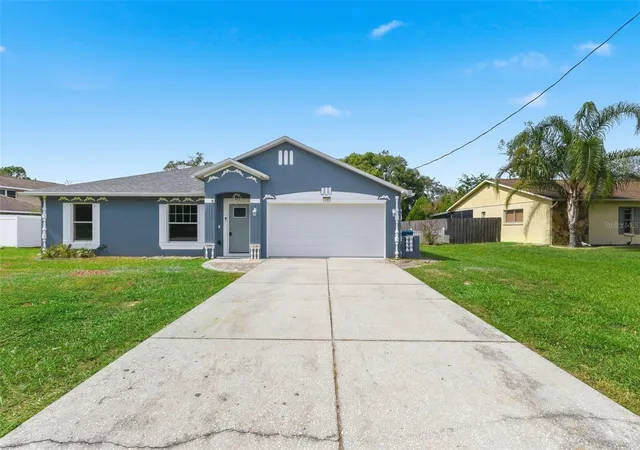 Photo 3 of Single family home for sale at 13393 Twin Lake Ave, Spring Hill, FL 34609 | MLS# TB8555044 | Listing updated on 2026-10-08