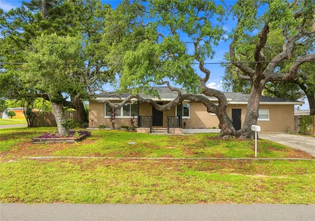 Single family home for sale at 10719 Cherokee Dr, Saint Petersburg, FL 33708 | MLS# TB8555089