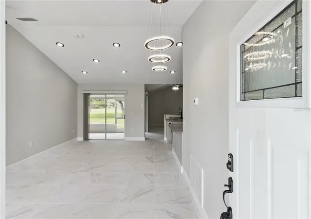 Photo 4 of Single family home for sale at 1011 Eiffel Ln, Kissimmee, FL 34759 | MLS# O6447383 | Listing updated on 2026-10-21