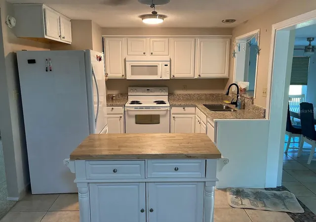 Photo 4 of Single family home for sale at 361 E Tarpon Blvd NW, Port Charlotte, FL 33952 | MLS# C7531578 | Listing updated on 2026-10-18