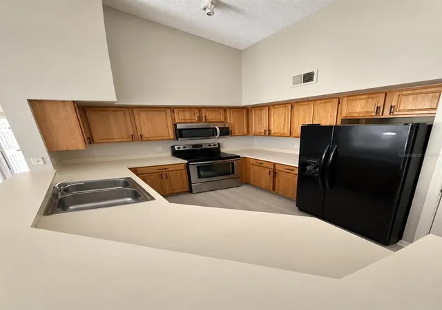 Photo 1 of Condo for sale at 13025 Mulberry Park Dr #321, Orlando, FL 32821 | MLS# O6447399 | Listing updated on 2026-10-09