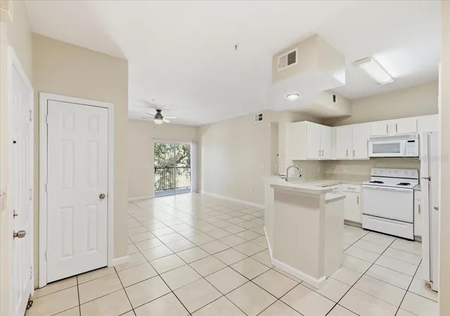Photo 3 of Condo for sale at 1985 Erving Cir #301, Ocoee, FL 34761 | MLS# O6447426 | Listing updated on 2026-10-07