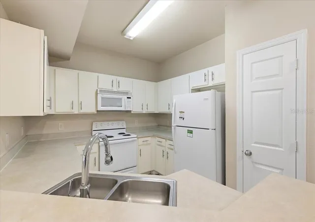 Photo 4 of Condo for sale at 1985 Erving Cir #301, Ocoee, FL 34761 | MLS# O6447426 | Listing updated on 2026-10-07