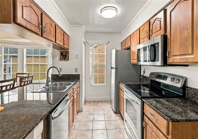 Photo 4 of Condo for sale at 2478 Sweetwater Clb Cir #92, Kissimmee, FL 34746 | MLS# O6447445 | Listing updated on 2026-10-09