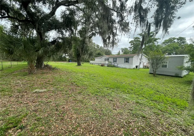 Photo 4 of Manufactured home for sale at 9211 Harney Baptist Church Rd, Tampa, FL 33637 | MLS# TB8555180 | Listing updated on 2026-10-10