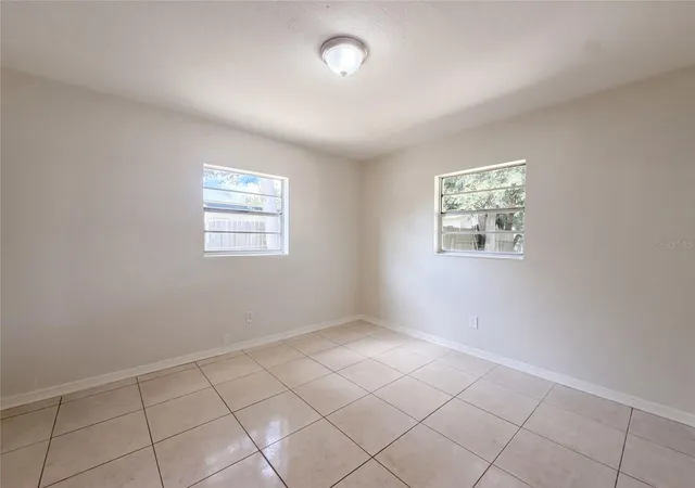 Photo 3 of Single family home for sale at 7916 Endive Ave, Tampa, FL 33619 | MLS# O6447458 | Listing updated on 2026-10-06