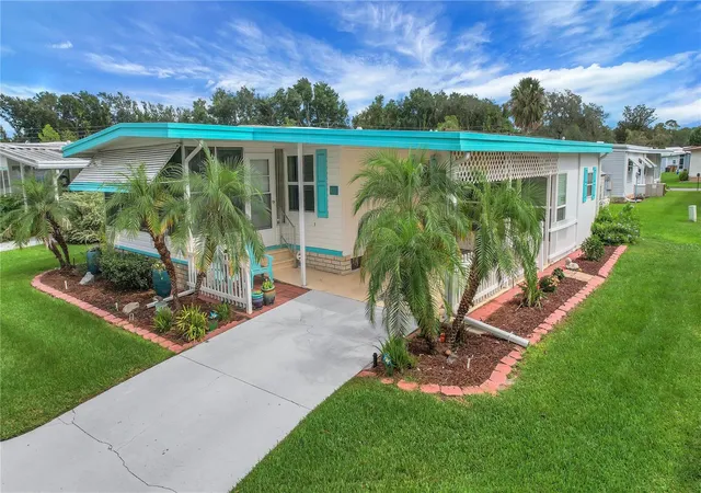 Photo 1 of Manufactured home for sale at 410 Hawthorne Blvd, Leesburg, FL 34748 | MLS# G5118681 | Listing updated on 2026-10-07