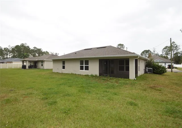 Photo 2 of Single family home for sale at 34 Renshaw Dr, Palm Coast, FL 32164 | MLS# FC321929 | Listing updated on 2026-10-12