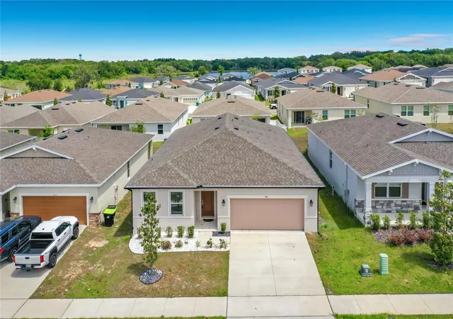 Photo 2 of Single family home for sale at 418 Quayside Ave, Mascotte, FL 34753 | MLS# O6447500 | Listing updated on 2026-10-13