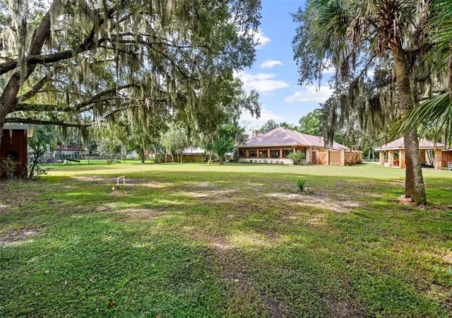 Photo 4 of Single family home for sale at 1713 Ford Rd, Mims, FL 32754 | MLS# O6447516 | Listing updated on 2026-10-08