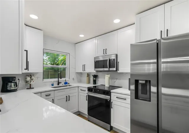 Photo 3 of Multi family home for sale at 3050 Meadow Lake Ave, Largo, FL 33771 | MLS# TB8555262 | Listing updated on 2026-10-07